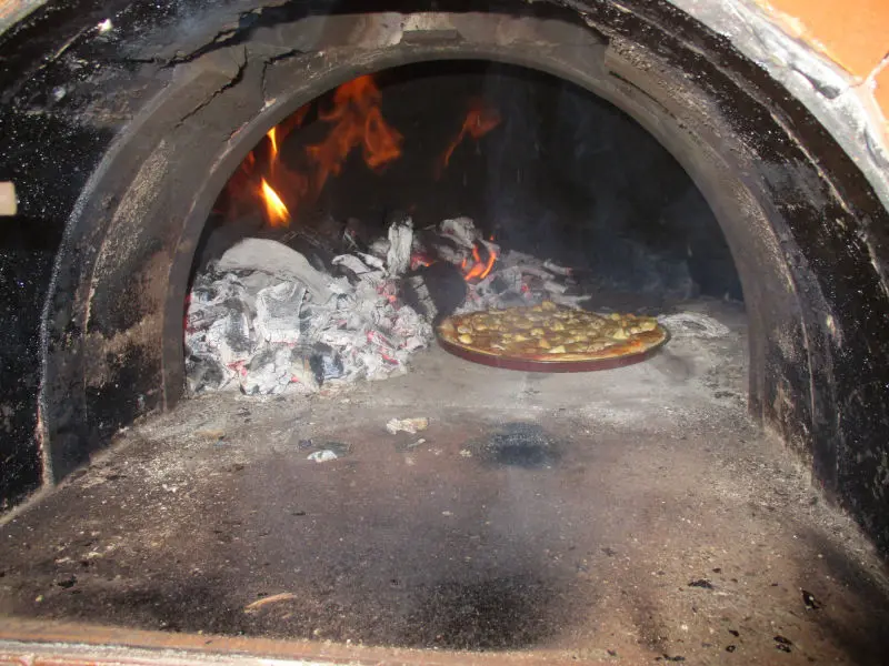 Pizza inside the Cocobello Woodoven